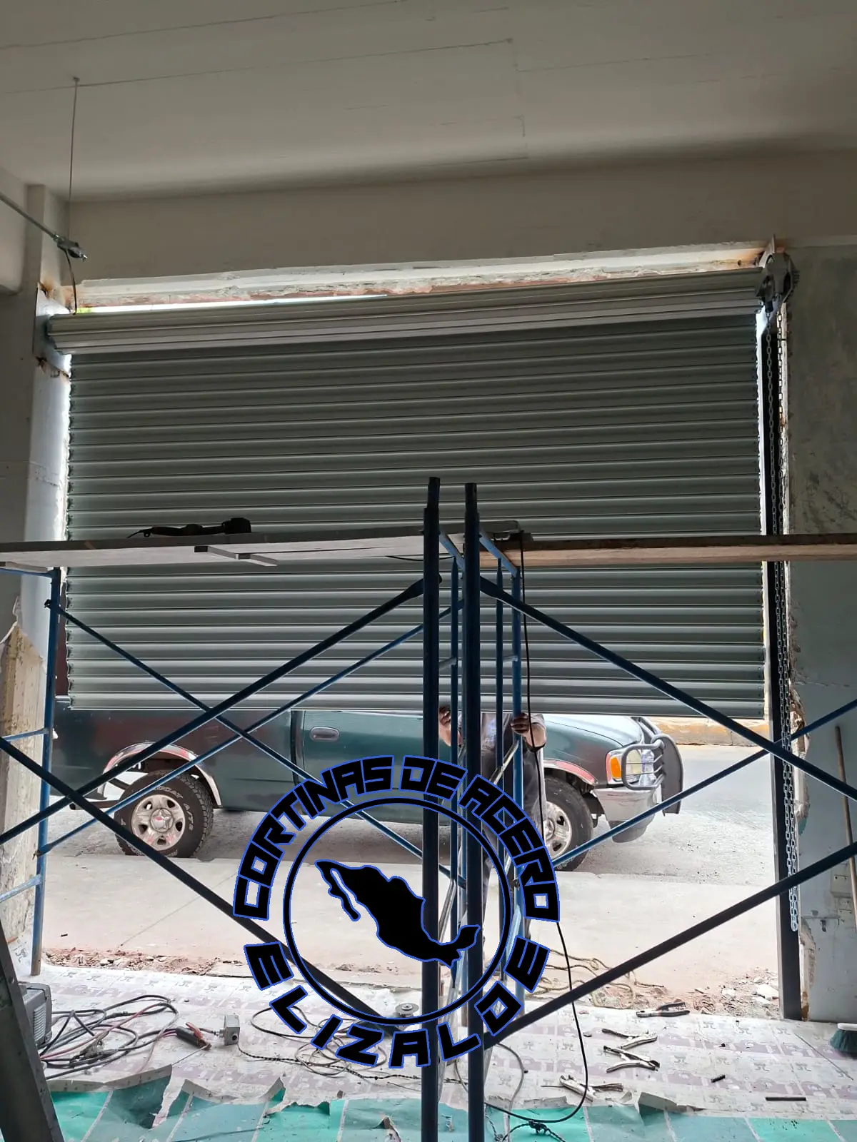 Motorización de cortinas metálicas